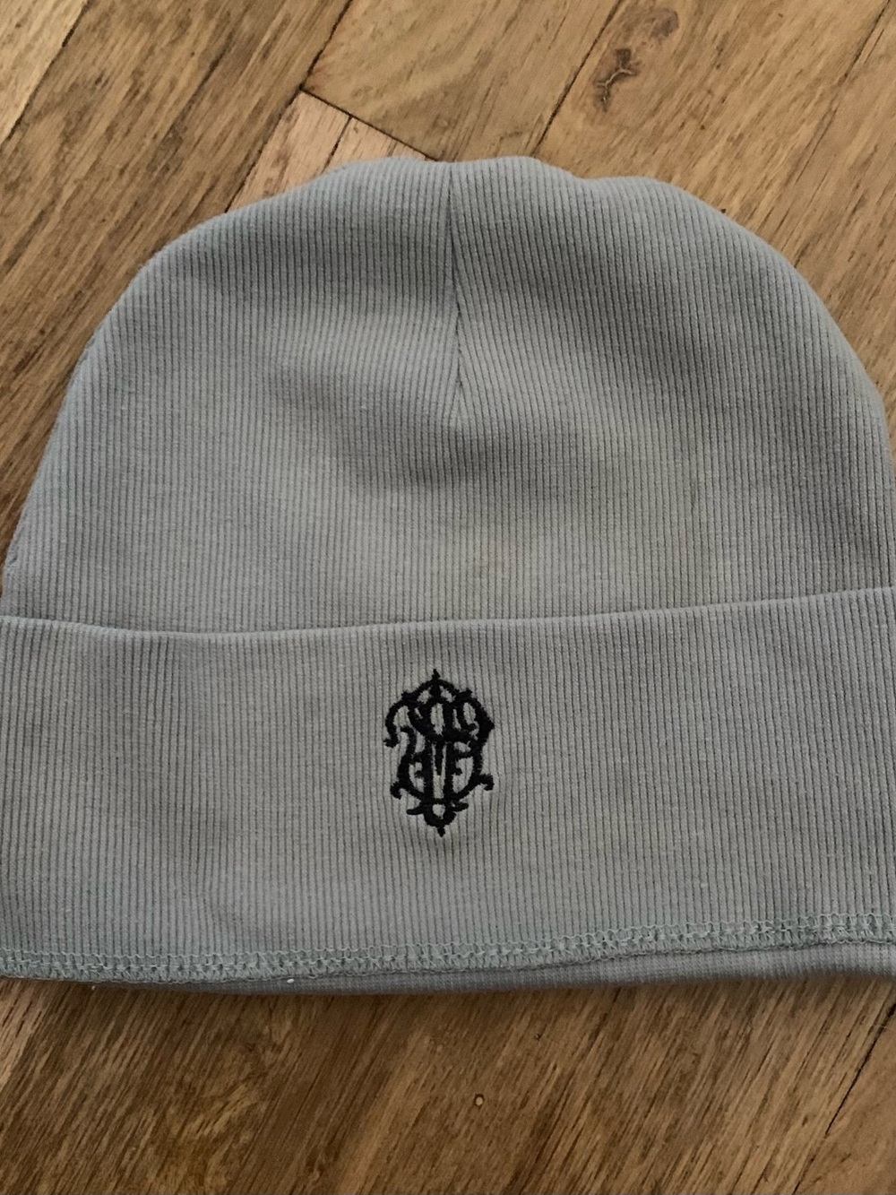 Light Gray Knit Beanie with Black Embroidered Emblem